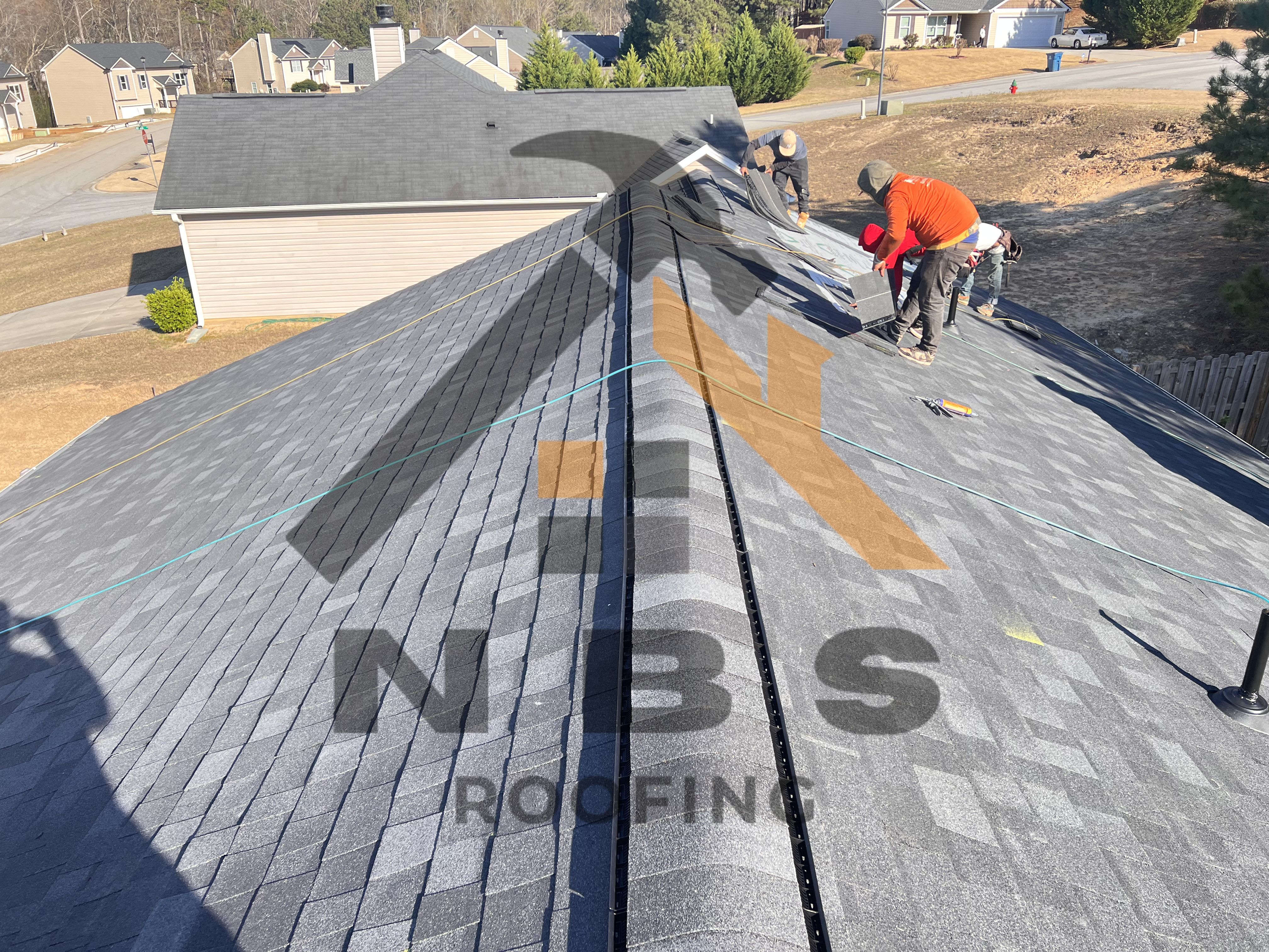 NBS team working on roof